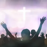 Hands raised in a crowd
