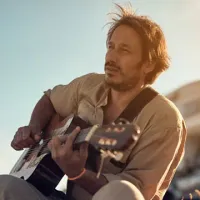 man playing guitar